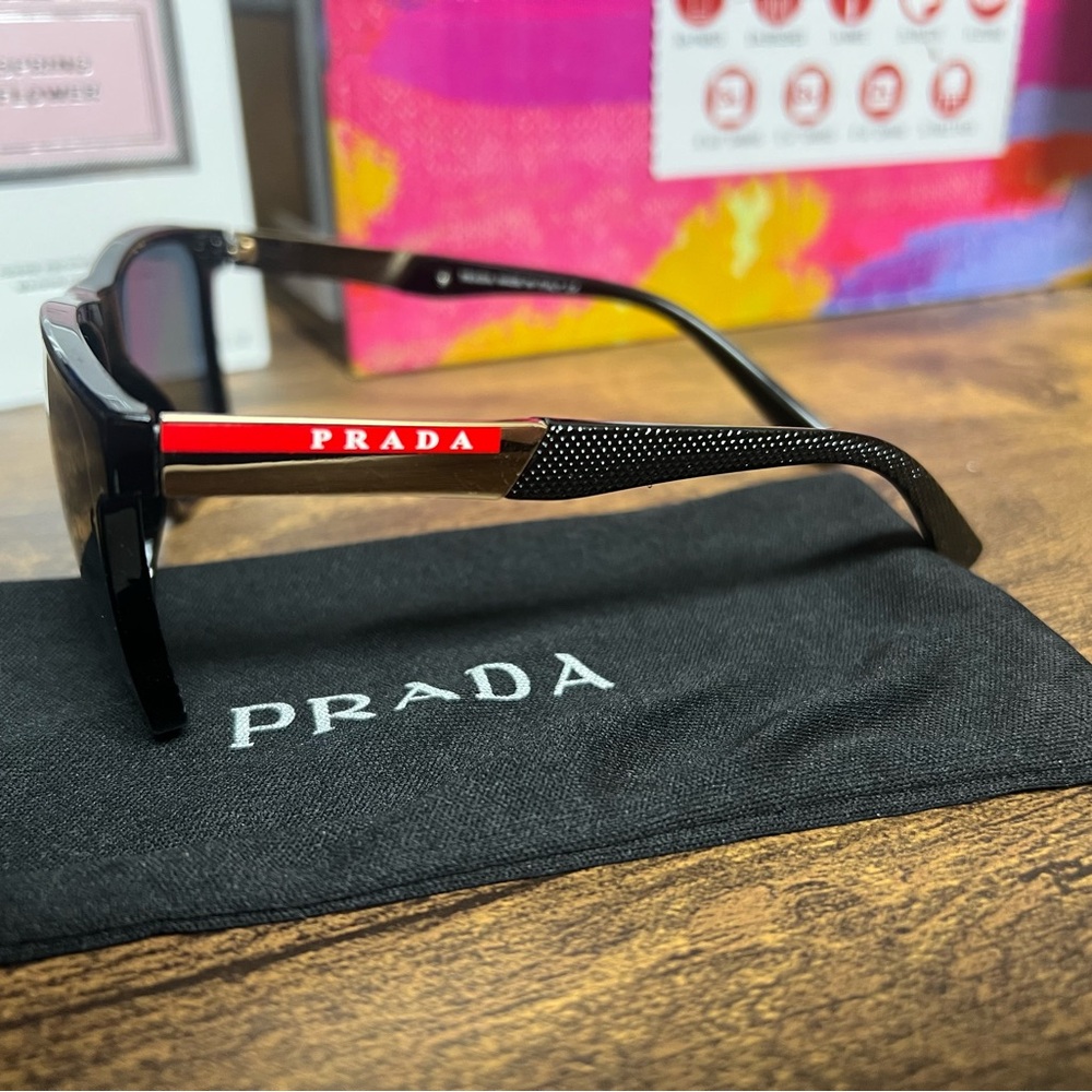 Prada Black Sunglasses with Gold and Red Temple Accents - Picture 3 of 3